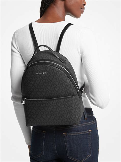 michael kors men's greyson logo backpack|sheila medium signature logo backpack.